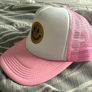 Not a brand but it’s a nice trucker hat and very good looking pink